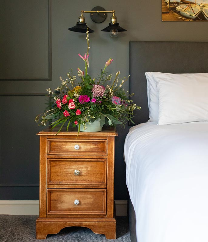 Bedside unit and flowers